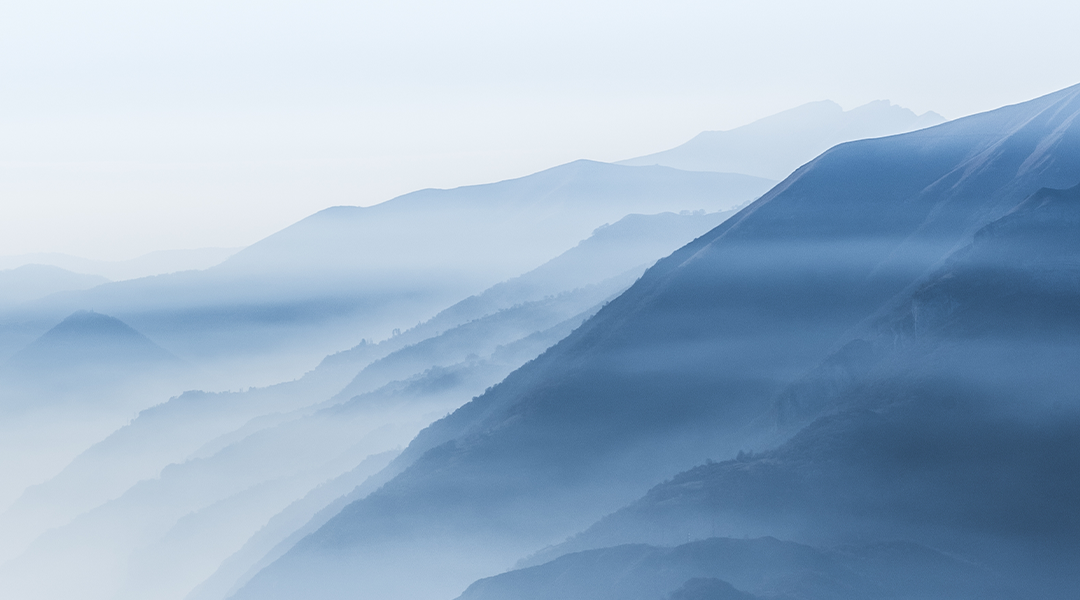 Serene mountain lake at dawn with mist – banner promoting mindful nature sounds for relaxation
